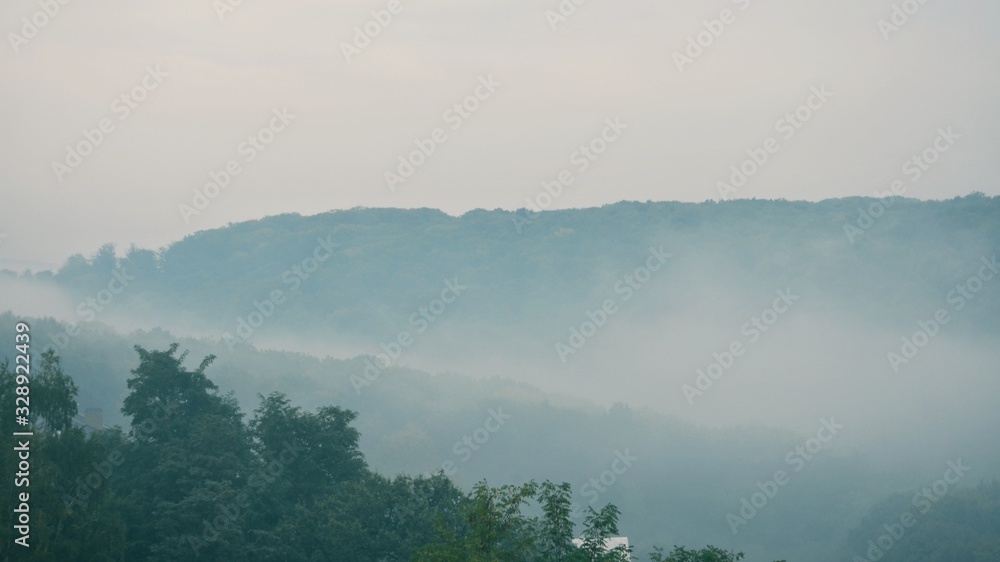 Panoramic view of morning fog in the mountains