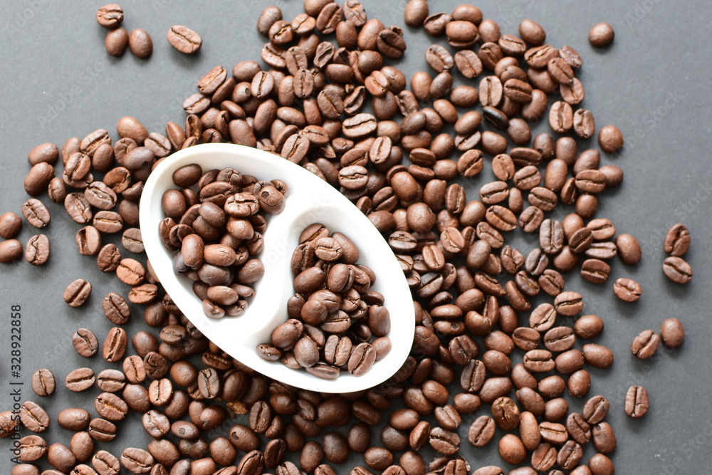 Fototapeta premium Colombian coffee beans, displayed in containers
