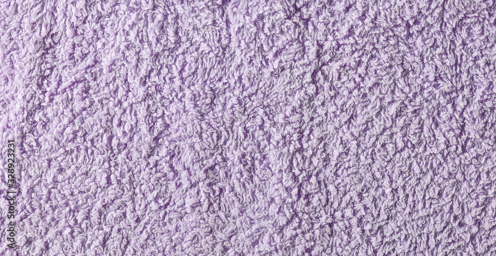 Purple crumpled textile, terry cloth background and texture Purple crumpled textile, terry cloth background and texture