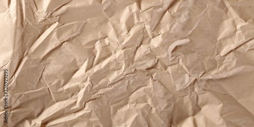 Crumpled brown decorative paper texture and background