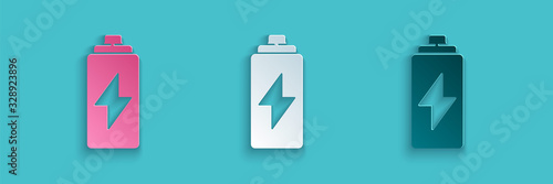 Paper cut Battery icon isolated on blue background. Lightning bolt symbol. Paper art style. Vector Illustration