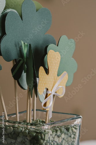 St Patricks Day vase arrangement with green clovers
