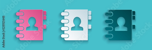 Paper cut Address book icon isolated on blue background. Notebook, address, contact, directory, phone, telephone book icon. Paper art style. Vector Illustration