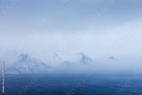 Wallpaper Mural Panorama of snowy fjords and mountain range, Senja, Norway Amazing Norway nature seascape popular tourist attraction. Best famous travel locations. beautiful sunset within the amazing winter landscape Torontodigital.ca