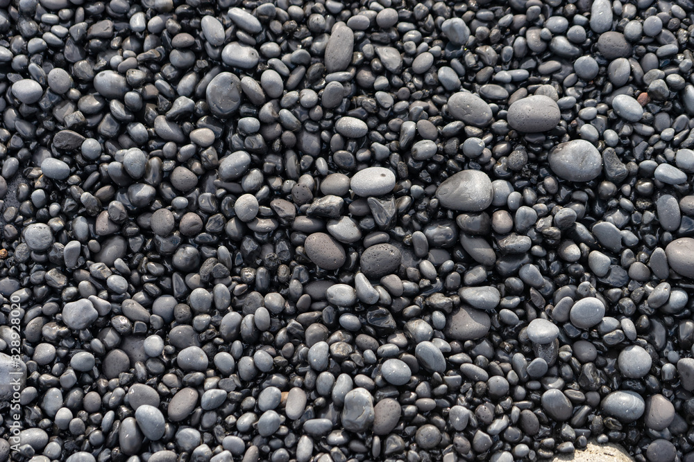 Volcanic rocks on black sand beach, Iceland Volcanic rocks on black sand beach, Iceland