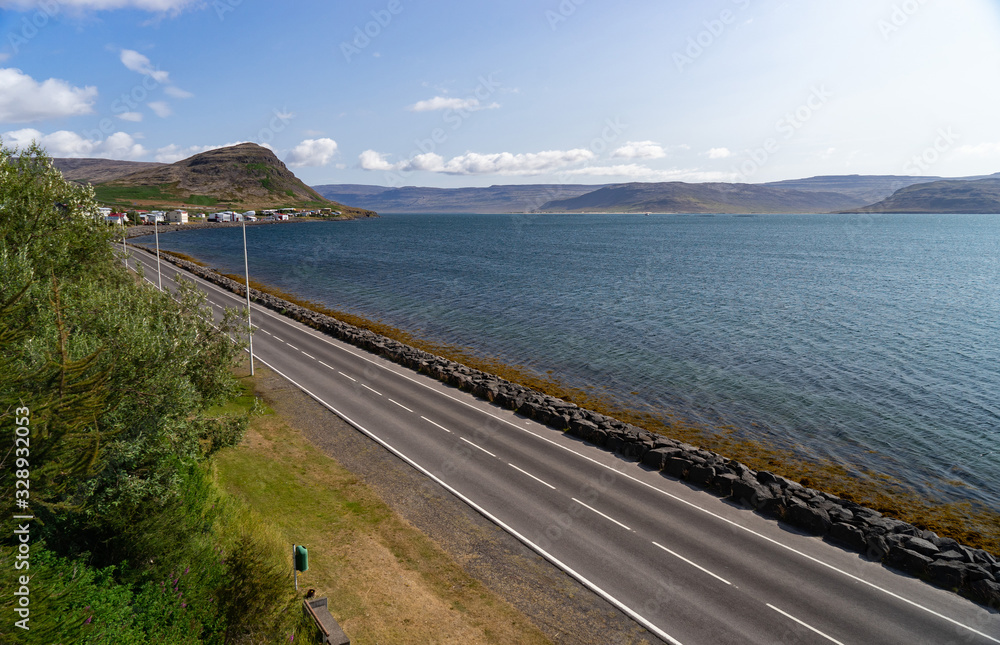 View of Patreksfjordur city in the West fjord during summertime. Iceland