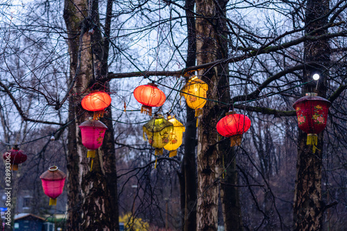 The entrance of an ancient Confucius Temple in Taiwan is decorated with colorful paper lanterns, which read 'wind, rain, good luck' for the Chinese New Year.