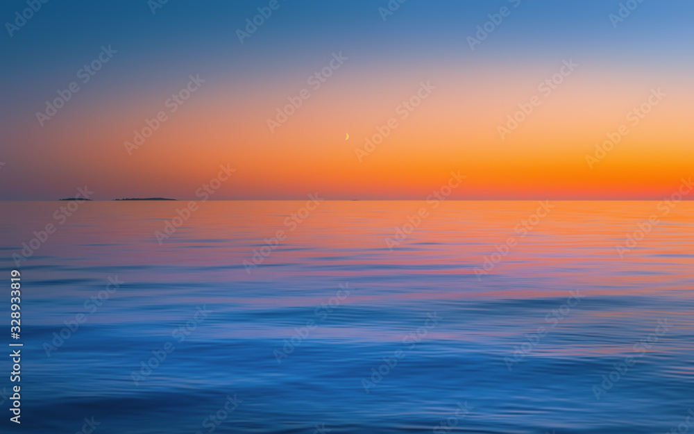 Blue Seascape With Fiery Golden Sunset