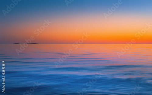 Blue Seascape With Fiery Golden Sunset
