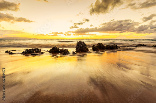 Maui Sunset with beach waves rocks