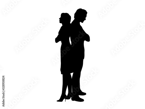 Silhouettes of man and woman stand with their backs to each other