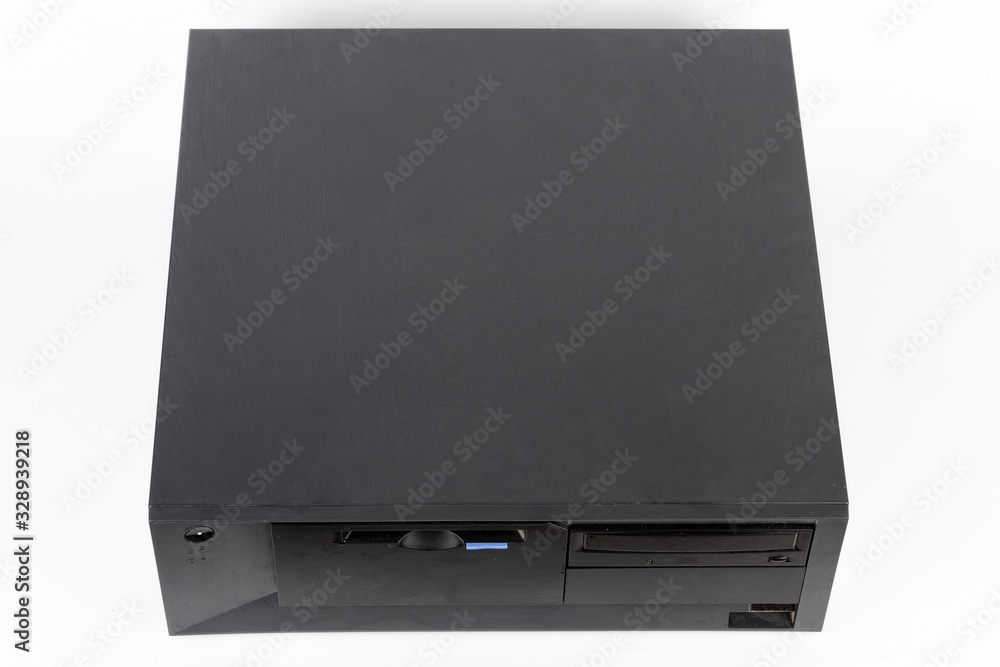 The old desktop computer, PC with floppy disk drive and cd drive on white background The old desktop computer, PC with floppy disk drive and cd drive on white background