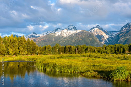 Looking across Snake River to the Grand Teton mountain range in Wyoming © mike