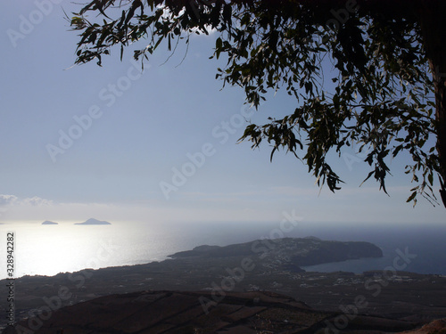 Panoramic view of the Aegean Sea and islands from the top of the mountain Mesa Vouno, on the island of Santorini, Greece. photo