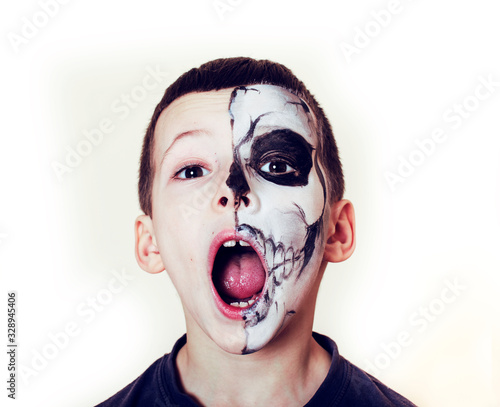 little cute boy with facepaint like skeleton to celebrate halloween  lifestyle people concept  children on holiday
