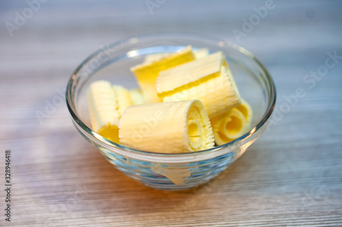 Butter parsley on a wooden table in a bowl