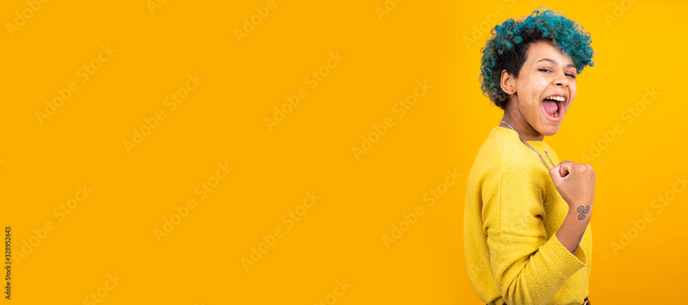 young african american girl or woman isolated on color background with space for advertisement or text young african american girl or woman isolated on color background with space for advertisement or text