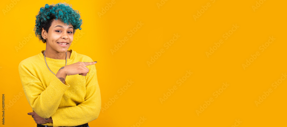 young african american girl or woman isolated on color background with space for advertisement or text young african american girl or woman isolated on color background with space for advertisement or text