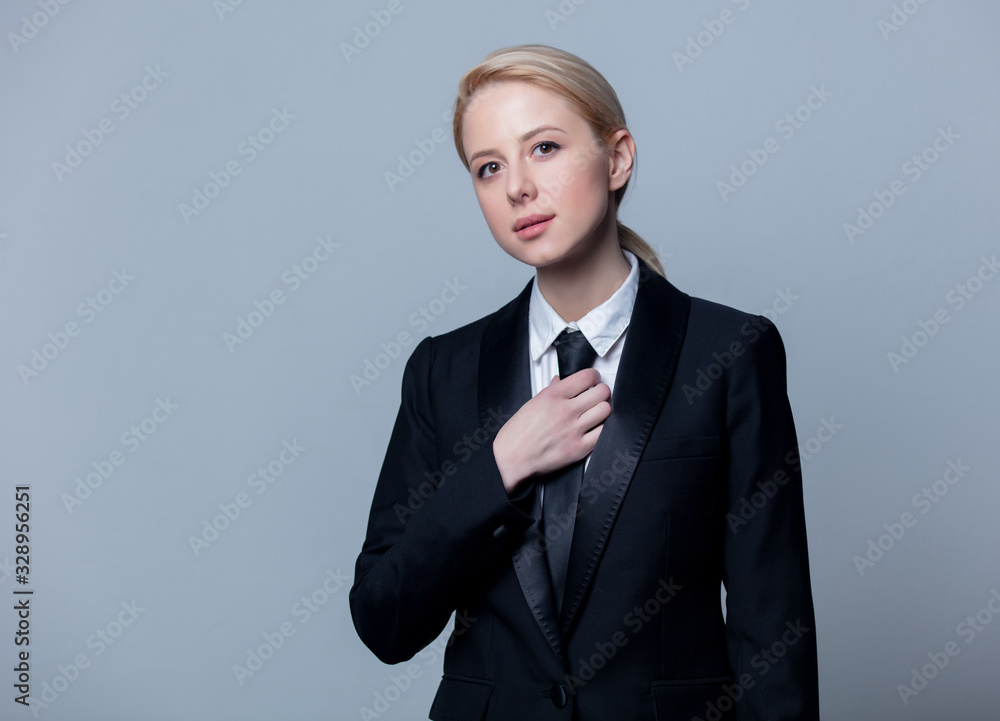 businesswoman in a classic black business suit businesswoman in a classic black business suit