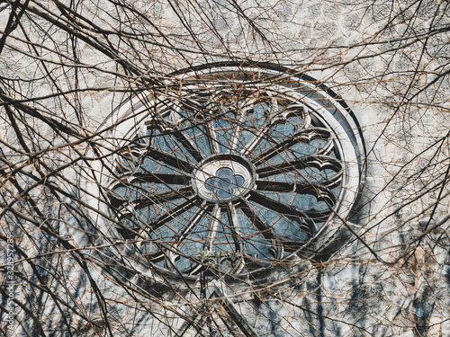 circular stained glass window in the Church of the late middle ages