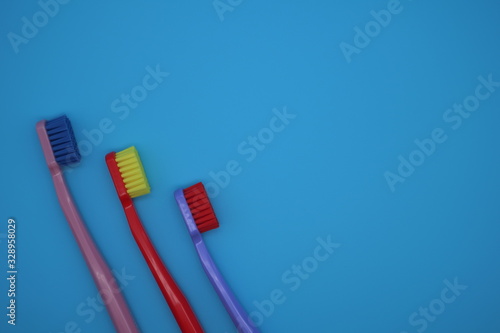 Tooth brushes on blue background