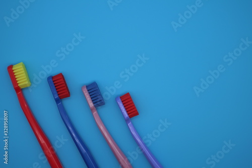 Tooth brushes on blue background