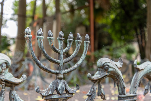 Fence decoration at a Grave at the Jewish Cemetery on Lido Island, Venice/Italy photo