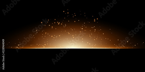 Transparent gold glowing light on a black background