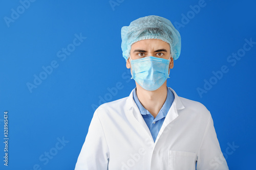 Male doctor with protective...