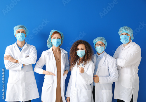 Group of doctors with prote...