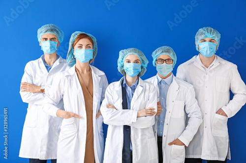 Group of doctors with prote...