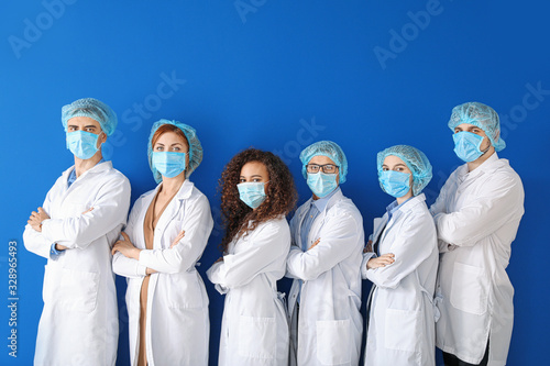 Group of doctors with prote...