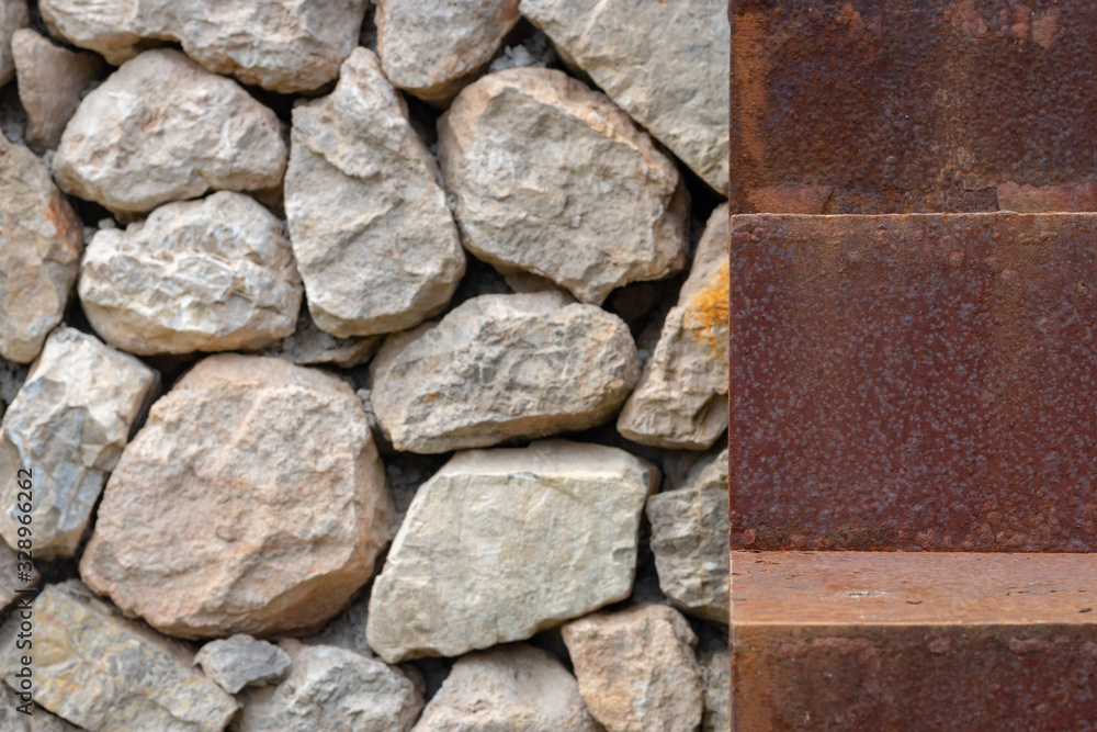 Rusty step of a stairway next to stone wall. Rusty step of a stairway next to stone wall.