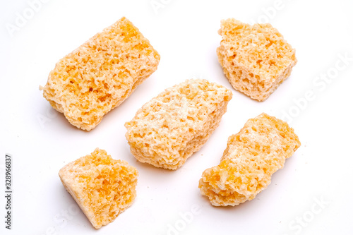 Honeycomb sugar isolated on white background