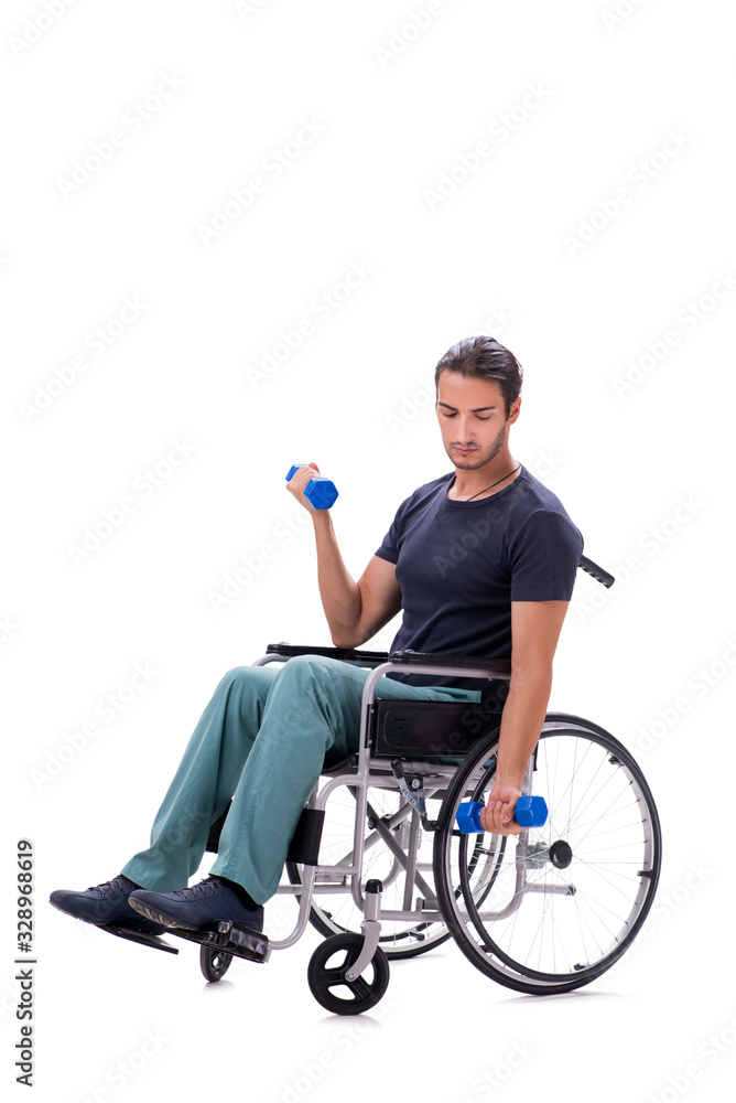 Young disabled man doing physical exercises isolated on white Young disabled man doing physical exercises isolated on white