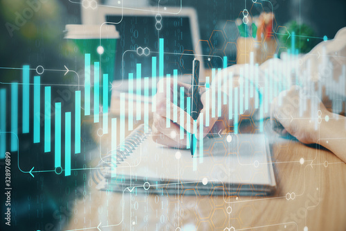 Forex chart displayed on woman's hand taking notes background. Concept of research. Double exposure