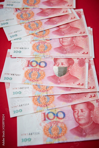 Chinese banknote wearing face mask photo