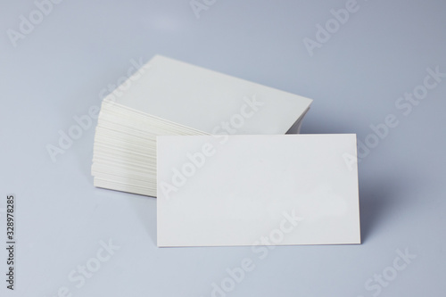 Business card mockup on white background. Corporate stationery set mockup. Business card stack on isolated background. Business card template. Top View and front view.