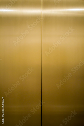 gold metal elevator door