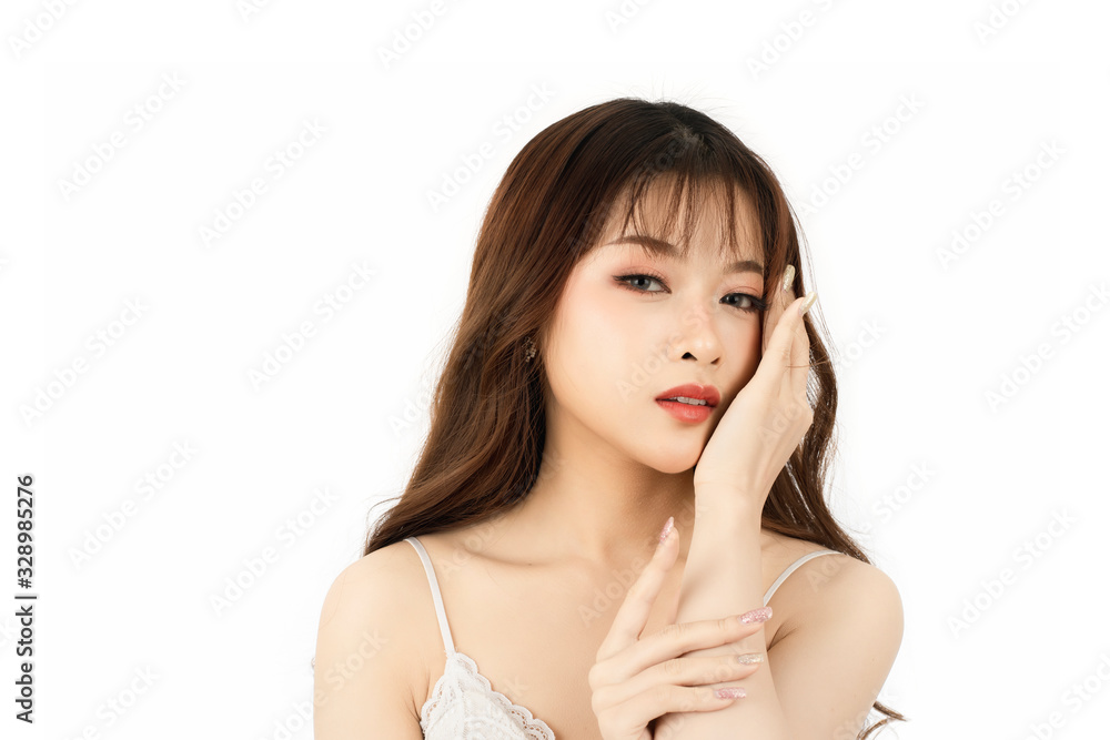 Portrait of attractive young woman with beauty skin and face isolated on white background. Healthy skin and face care concept. Portrait of attractive young woman with beauty skin and face isolated on white background. Healthy skin and face care concept.