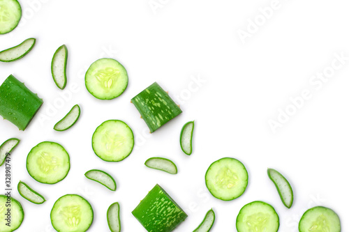 Closeup green fresh organic aloe vera and cucumber slices pattern texture for background. Natural herbal medical plant ,skincare ,healthcare  and beauty spa concept. Top view. Flat lay.