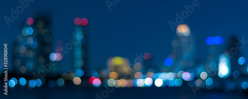 Banner cover of blurred bokeh cityscape at twilight time, city background, ae...