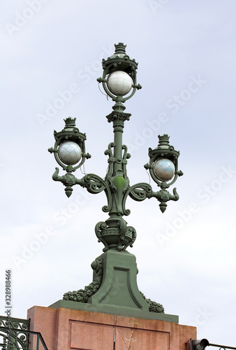 Cast-iron street lamp on the bridge