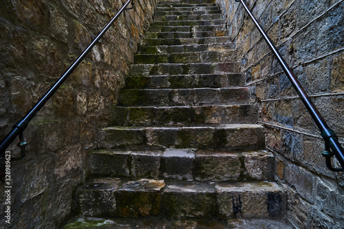 Fototapeta Naklejka Na Ścianę i Meble -  Image of an ancient stone staircase.