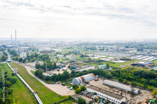 aerial view of sewage water treatment plant at industrial district of city