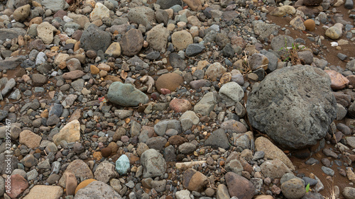 Rocks in the river after the flood. Images suitable for use as wallpaper or graphic material