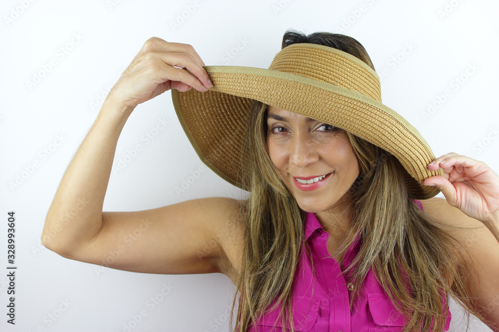Beautiful Colombian Woman wearing a summer hat and smile Beautiful Colombian Woman wearing a summer hat and smile