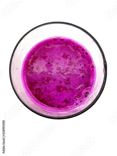 A glass of red dragon fruit juice