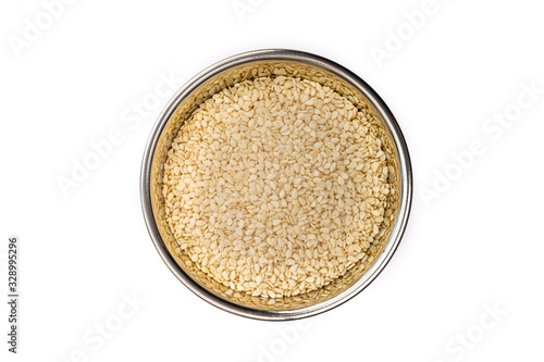 Sesame Seed in Stainless Steel bowl isolated on a white background, cooking ingredient and garnish. Closeup detail, delicious raw seed.