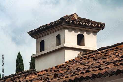 Smokestack detail in colonial house of La Antigua Guatemala, in Central America, Spanish heritage, outdoor architectural detail usually made of brick and tiles.